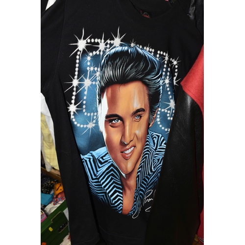 616 - A LARGE QUANTITY OF LOOSE GENTLEMENS CLOTHING, a quantity of Elvis themed T-shirts and jackets to in... 