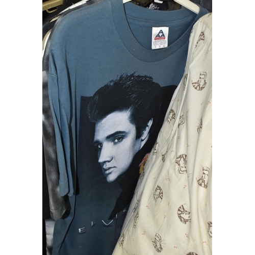 616 - A LARGE QUANTITY OF LOOSE GENTLEMENS CLOTHING, a quantity of Elvis themed T-shirts and jackets to in... 