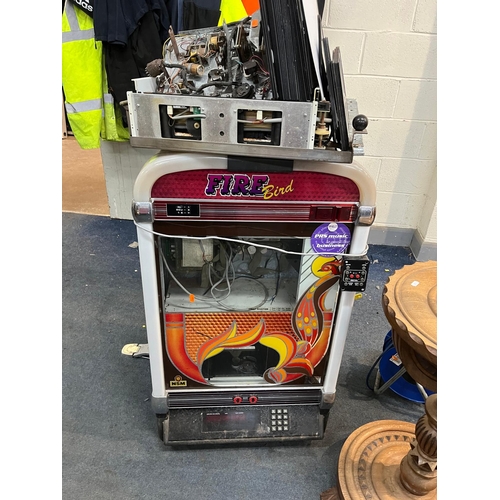 1109 - A NSM FIRE BIRD COMPACT DISC JUKEBOX ON STAND in need of attention width 59cm depth 46cm height 185c... 