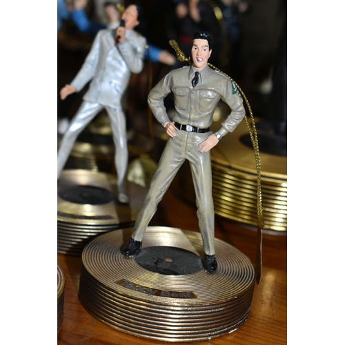 355 - A COLLECTION OF MUSICAL 'ELVIS' FIGURINES, comprising four Franklin Mint music box figures, 'Burning... 