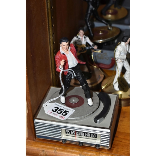 355 - A COLLECTION OF MUSICAL 'ELVIS' FIGURINES, comprising four Franklin Mint music box figures, 'Burning... 