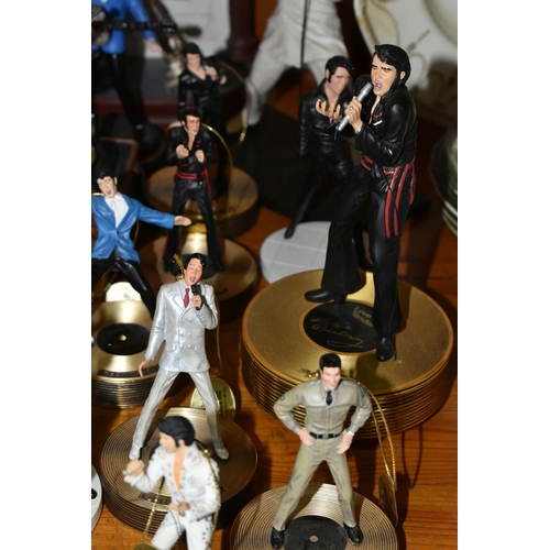 355 - A COLLECTION OF MUSICAL 'ELVIS' FIGURINES, comprising four Franklin Mint music box figures, 'Burning... 