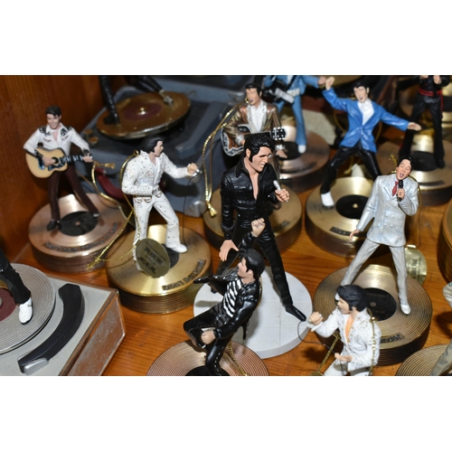 355 - A COLLECTION OF MUSICAL 'ELVIS' FIGURINES, comprising four Franklin Mint music box figures, 'Burning... 