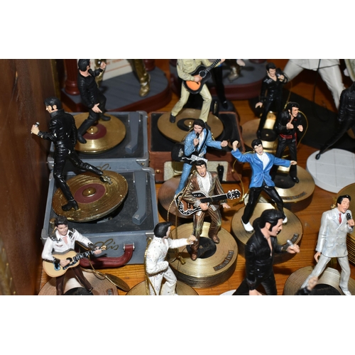 355 - A COLLECTION OF MUSICAL 'ELVIS' FIGURINES, comprising four Franklin Mint music box figures, 'Burning... 