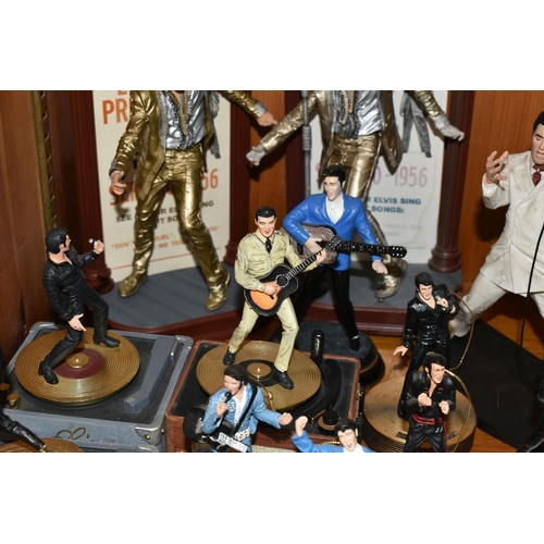 355 - A COLLECTION OF MUSICAL 'ELVIS' FIGURINES, comprising four Franklin Mint music box figures, 'Burning... 