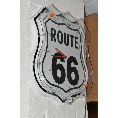 464 - A 'ROUTE 66' NEON ILLUMINATED WALL CLOCK, shield shape, with clear Perspex front marked with dashes ... 