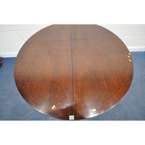 1214 - A 20TH CENTURY MAHOGANY EXTENDING DINING TABLE, with a single fold out leaf, raised on four splayed ... 