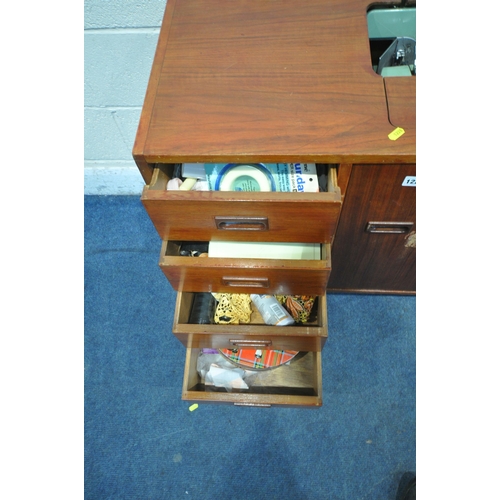 1228 - A MID CENTURY DELTA SEWING MACHINE, with contents, an oak media cabinet, a mahogany media cabinet, a... 