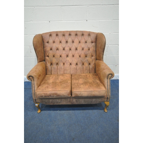 1240 - A BROWN SUEDE UPHOLSTERED CHESTERFIELD WING BACK TWO SEATER SOFA, on cabriole front legs, width 130c... 