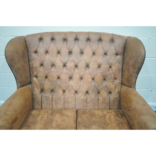 1240 - A BROWN SUEDE UPHOLSTERED CHESTERFIELD WING BACK TWO SEATER SOFA, on cabriole front legs, width 130c... 