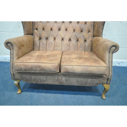 1240 - A BROWN SUEDE UPHOLSTERED CHESTERFIELD WING BACK TWO SEATER SOFA, on cabriole front legs, width 130c... 