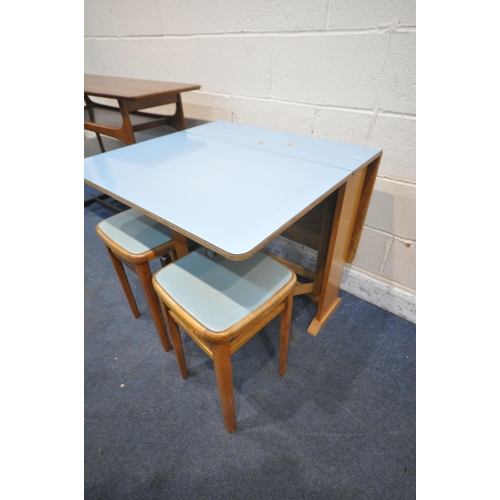 1246 - A MID CENTURY PALE BLUE FORMICA TOP GATE LEG TABLE, and two stools, along with an oak coffee table a... 