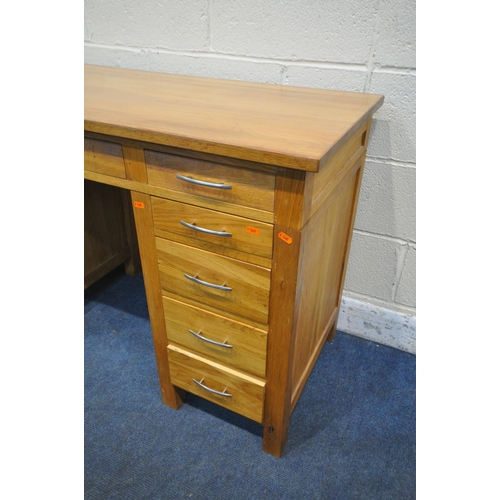 1274 - A SOLID OAK PEDESTAL DESK, with eleven drawers, width 122cm x depth 52cm x height 79cm (condition re... 