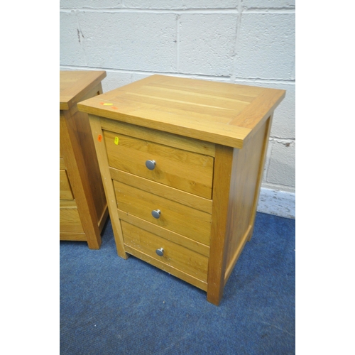 1279 - A PAIR OF SOLID THREE DRAWER BEDSIDES (condition report: one bedside with water stains)