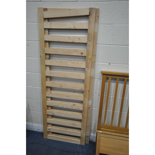 1288 - A SOLID OAK 4FT6 BEDSTEAD, with side rails, slats and supports (condition report: general signs of u... 