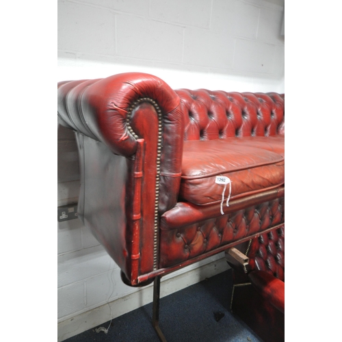 1292 - A BURGUNDY LEATHER CHESTERFIELD SOFA, width 188cm x depth 85cm x height 68cm (condition report: with... 