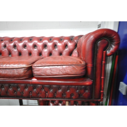 1292 - A BURGUNDY LEATHER CHESTERFIELD SOFA, width 188cm x depth 85cm x height 68cm (condition report: with... 