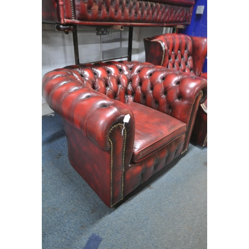 1294 - A BURGUNDY LEATHER CHESTERFIELD CLUB CHAIR, width 107cm x depth 89cm x height 70cm, and chesterfield... 