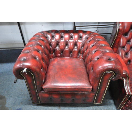 1294 - A BURGUNDY LEATHER CHESTERFIELD CLUB CHAIR, width 107cm x depth 89cm x height 70cm, and chesterfield... 