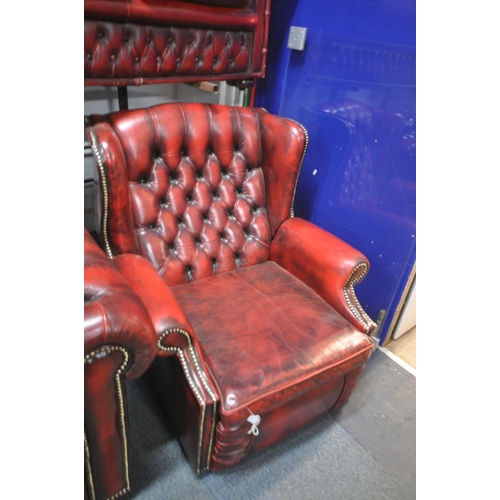 1294 - A BURGUNDY LEATHER CHESTERFIELD CLUB CHAIR, width 107cm x depth 89cm x height 70cm, and chesterfield... 