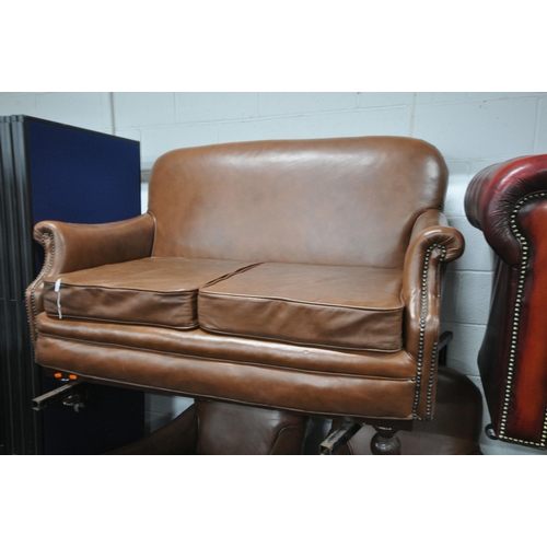 1296 - A BROWN LEATHER THREE PIECE LOUNGE SUITE, to include a two seater settee, 131cm x depth 77cm, and a ... 