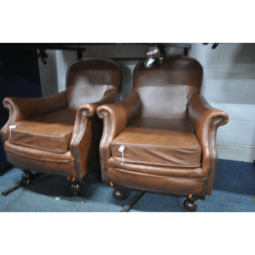 1296 - A BROWN LEATHER THREE PIECE LOUNGE SUITE, to include a two seater settee, 131cm x depth 77cm, and a ... 