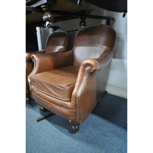 1296 - A BROWN LEATHER THREE PIECE LOUNGE SUITE, to include a two seater settee, 131cm x depth 77cm, and a ... 