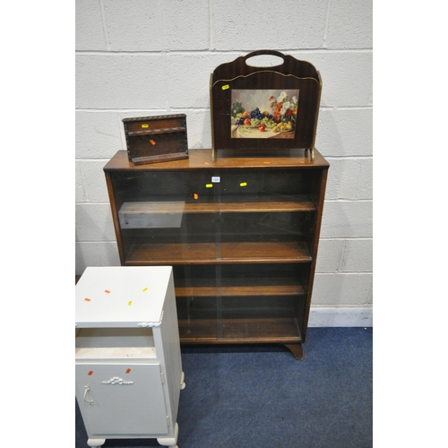 1301 - A MID CENTURY BOOKCASE, with two pairs of glazed sliding doors, width 91cm x depth 27cm x height 112... 