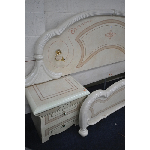 1320 - AN ITALIAN CREAM FINISH BEDSTEAD, with a shaped headboard that has a pair of lamp, flanked by two dr... 