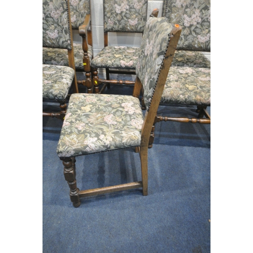 1322 - A SET OF SIX 20TH CENTURY OAK CHAIRS, including two carvers, with foliate upholstery (condition repo... 