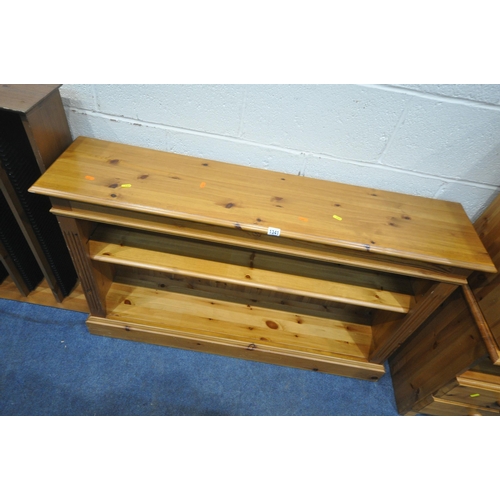 1341 - A SELECTION OF PINE FURNITURE, to include a low bookcase, width 127cm x depth 29cm x height 79cm, a ... 