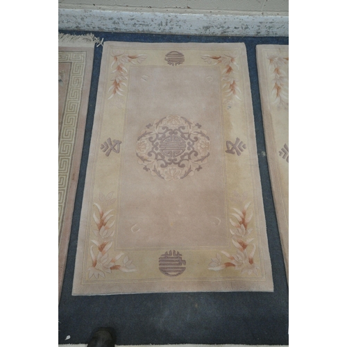 1342 - FOR RECTANGULAR CHINESE RUGS, three pink ones and one white one, largest 181cm x 122cm (condition re... 