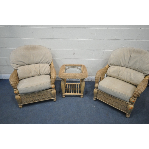 1343 - A RATTAN THREE PIECE CONSERVATORY SUITE, comprising a pair of armchairs, along with a side table, wi... 