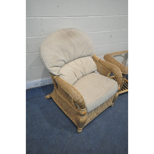 1343 - A RATTAN THREE PIECE CONSERVATORY SUITE, comprising a pair of armchairs, along with a side table, wi... 