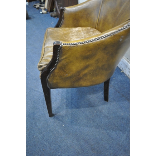 1354 - A MUSTARD LEATHER TUB CHAIR, width 65cm x depth 68cm x height 83cm (condition report: cushion worn a... 