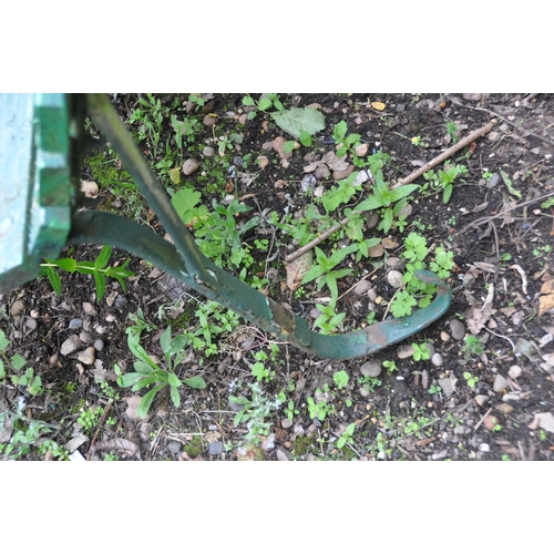 1012 - A GREEN PAINTED GARDEN BENCH, raised on wrought iron legs, length 180cm (condition report: has a cou... 