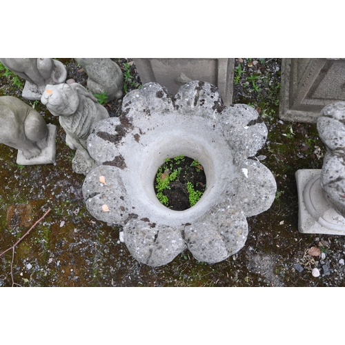 1023 - A PAIR OF COMPOSITE GARDEN URNS, of a tapered form, diameter 48cm x height 57cm (condition report: s... 