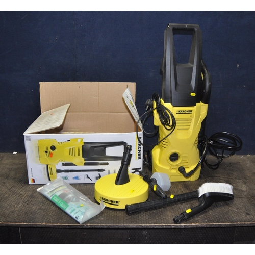 1058 - A  KARCHER K2 PRESSURE WASHER IN ORIGINAL BOX with patio heads, lance and two heads, car brush and s... 