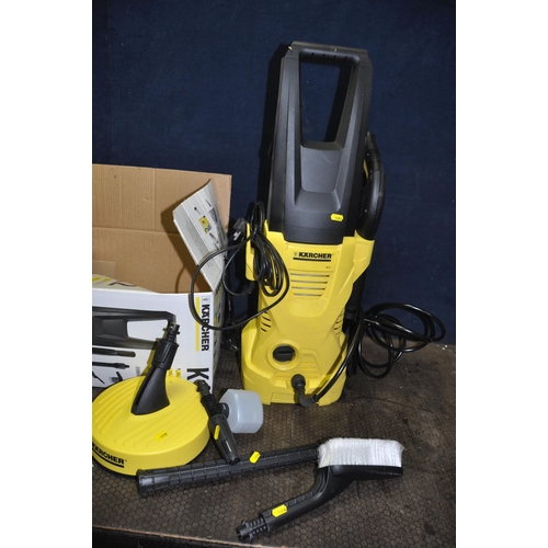 1058 - A  KARCHER K2 PRESSURE WASHER IN ORIGINAL BOX with patio heads, lance and two heads, car brush and s... 