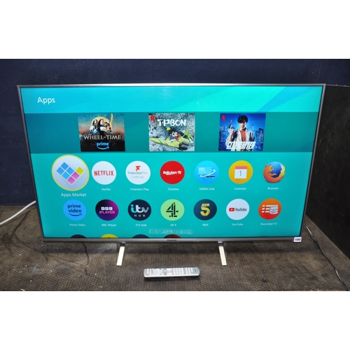 1080 - A PANASONIC TX-50DZ700B 50 INCH LED SMART TV, with remote (PAT pass and working)