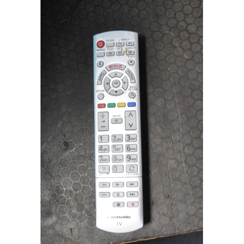 1080 - A PANASONIC TX-50DZ700B 50 INCH LED SMART TV, with remote (PAT pass and working)