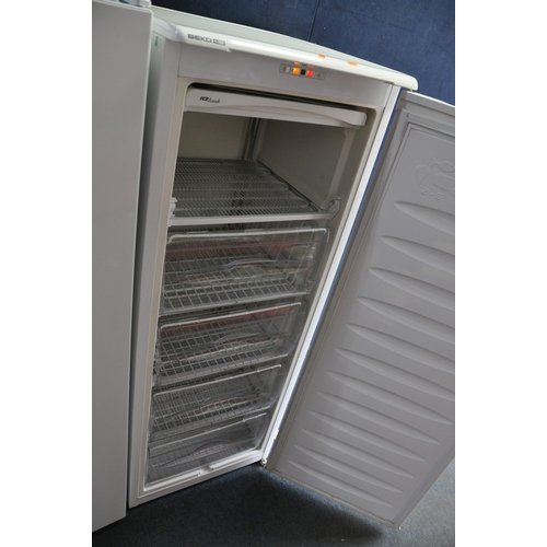 1089 - A BEKO TZS 490 LARDER FREEZER, 56cm squared x heigh 145cm (condition report: PAT pass and working at... 