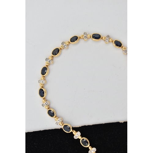 1 - A YELLOW METAL DIAMOND AND SAPPHIRE BRACELET, comprised of eighteen oval cut sapphires in a bezel se... 