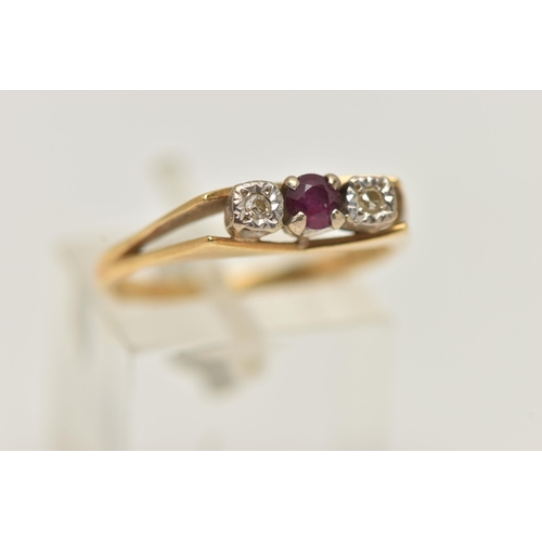 14 - AN 18CT GOLD RUBY AND DIAMOND RING, a single circular cut ruby and two illusion set single cut diamo... 