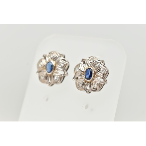 31 - A PAIR OF SAPPHIRE AND DIAMOND STUD EARRINGS, each designed as a scalloped panel with a central oval... 