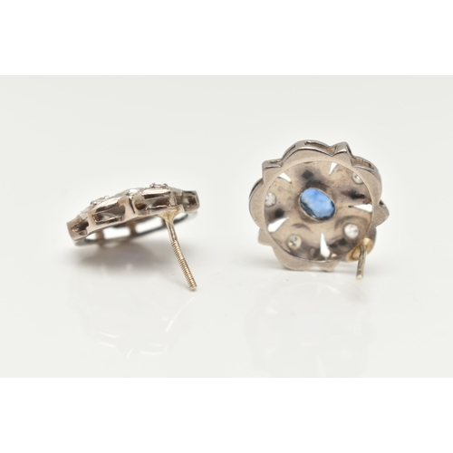 31 - A PAIR OF SAPPHIRE AND DIAMOND STUD EARRINGS, each designed as a scalloped panel with a central oval... 