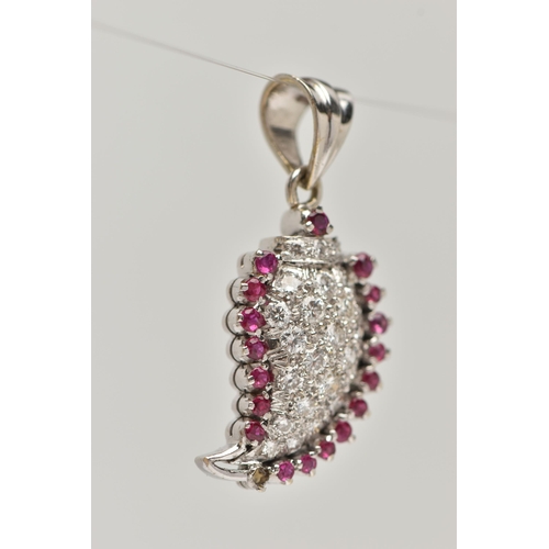 32 - A DIAMOND AND RUBY PENDANT, the drop shape pendant  set with brilliant cut diamonds and edged in cir... 