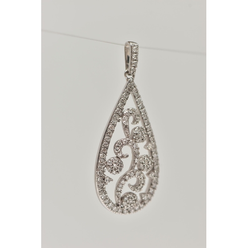 38 - A 9CT GOLD DIAMOND PENDANT, the pear shape pendant of open work scrolling design, set with single cu... 