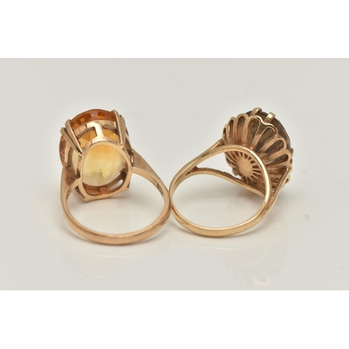 4 - TWO 9CT GOLD GEM SET RINGS, the first an oval cut citrine, prong set in yellow gold, approximate sto... 