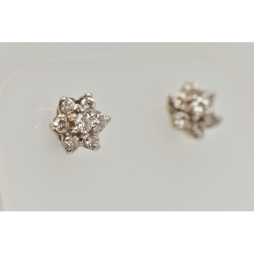 40 - A PAIR OF DIAMOND CLUSTER STUD EARRINGS, designed as two tiers of brilliant cut diamonds in claw set... 